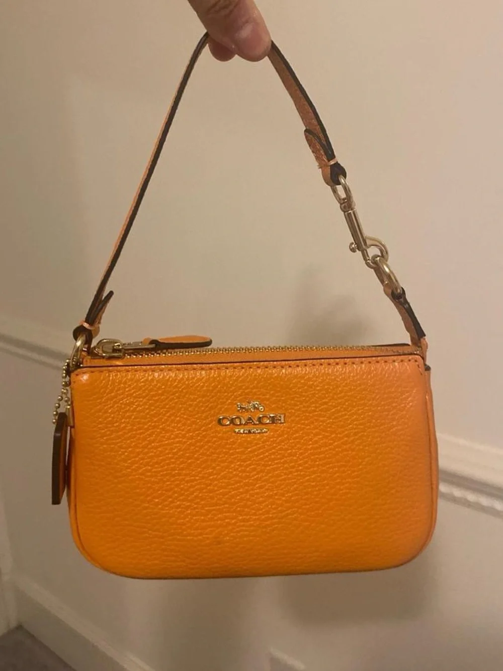 Coach Orange Pebbled Leather Wristlet with Gold Hardware